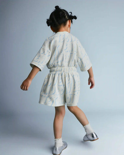 Toddler Girl Flowy Romper in Otter Avenue Print - Cream